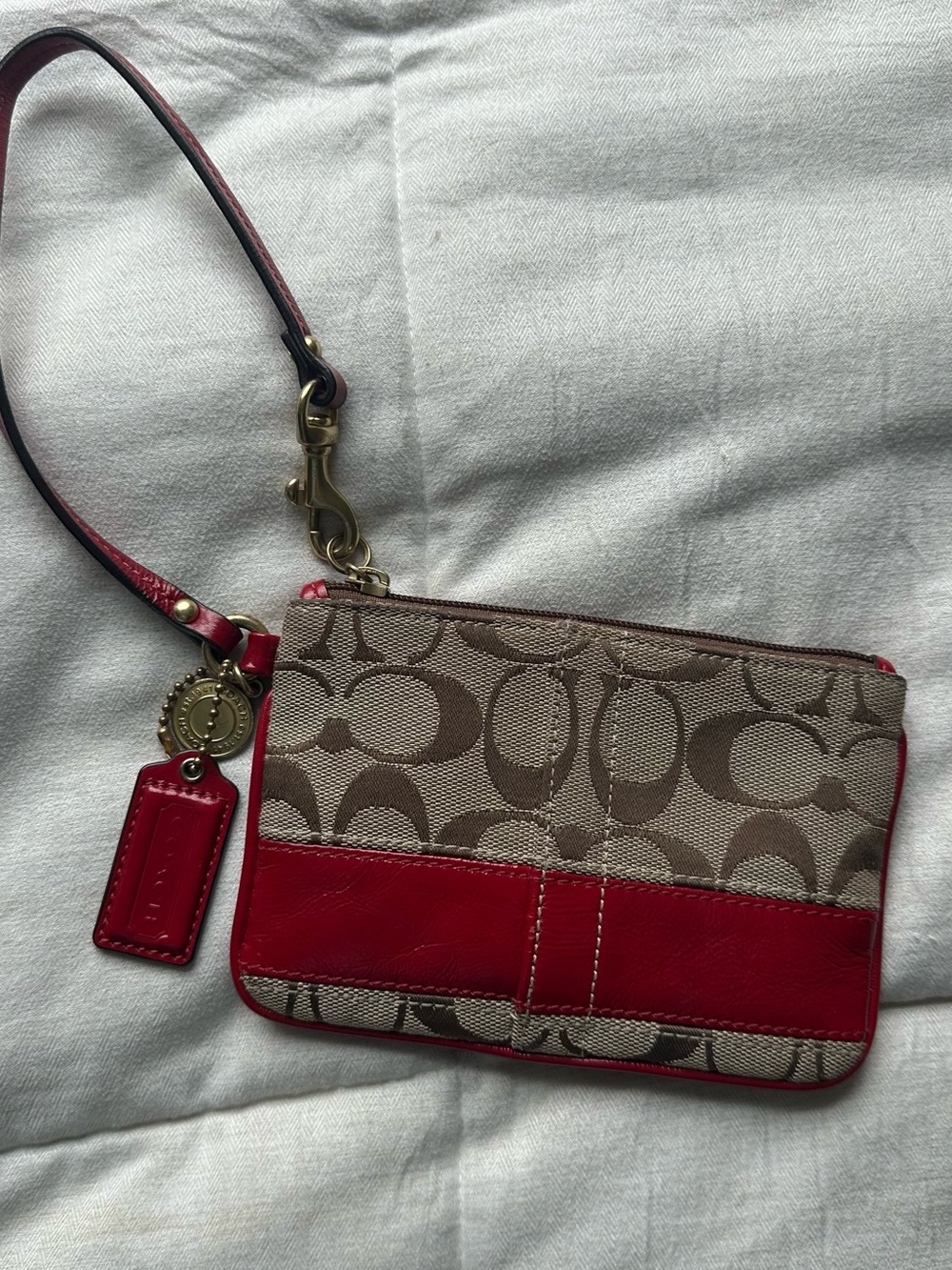 Coach Tan Signature Canvas Wristlet with Red Leather Trim